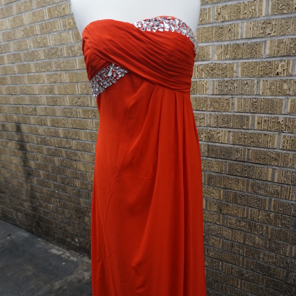 Red strapless evening gown